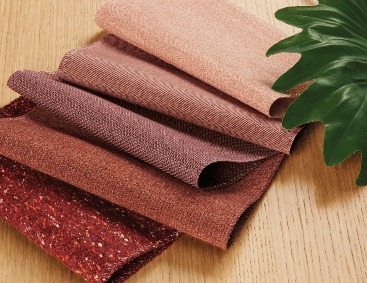 a living room with a large round rug and chairs